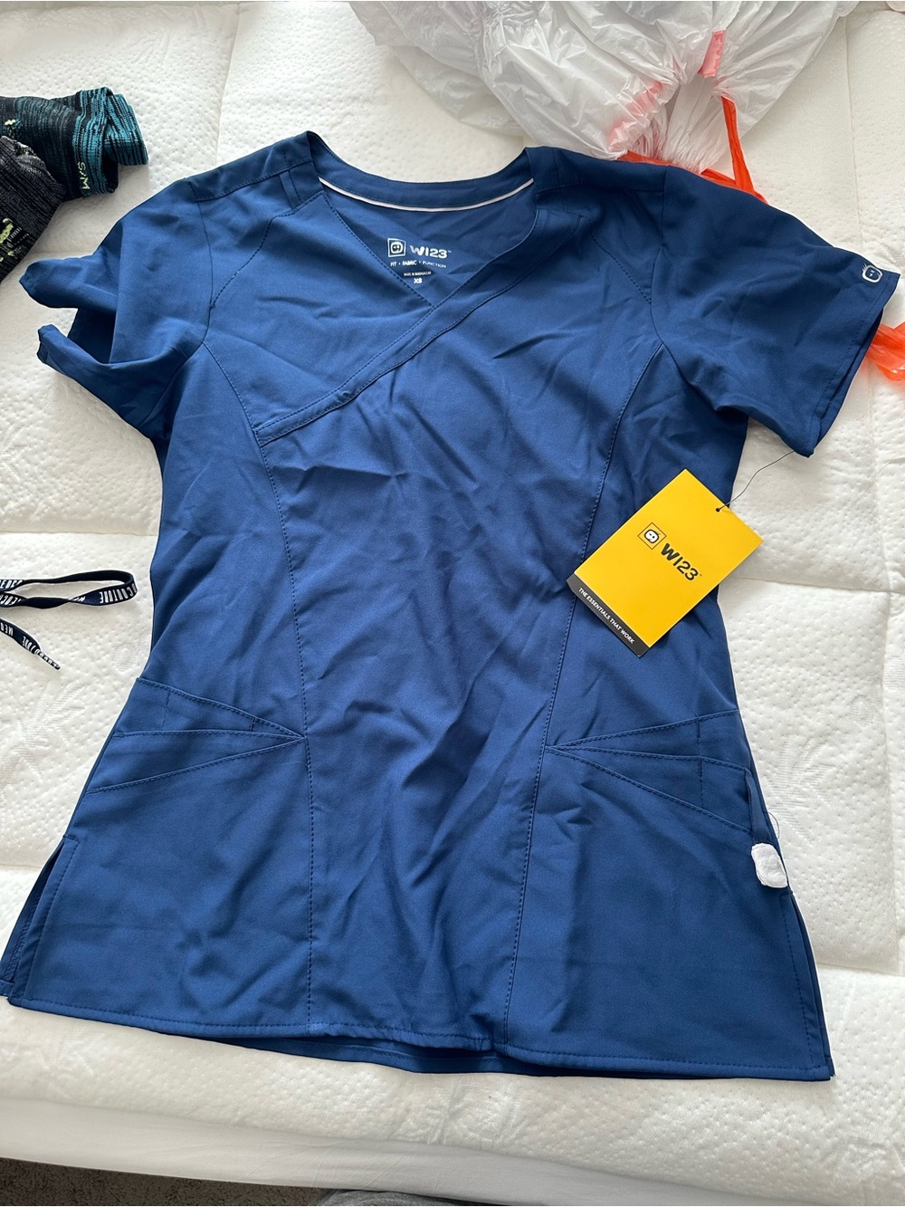 WI23 Womens scrub top - XS size - Blue color
